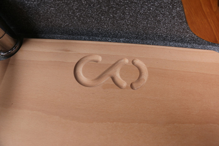 Contessa 32 chopping board logo